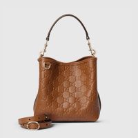 Gucci GG Emblem Small Bucket Bag In GG Embossed Leather 815118 Brown
