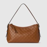 Gucci GG Emblem Medium Shoulder Bag In GG Embossed Leather 847449 Brown