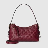 Gucci GG Emblem Small Shoulder Bag In GG Embossed Leather 847450 Red