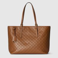 Gucci GG Emblem Medium Tote Bag In GG Embossed Leather 847455 Brown