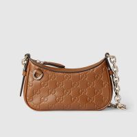 Gucci GG Emblem Mini Shoulder Bag 847091 In GG Embossed Leather Brown
